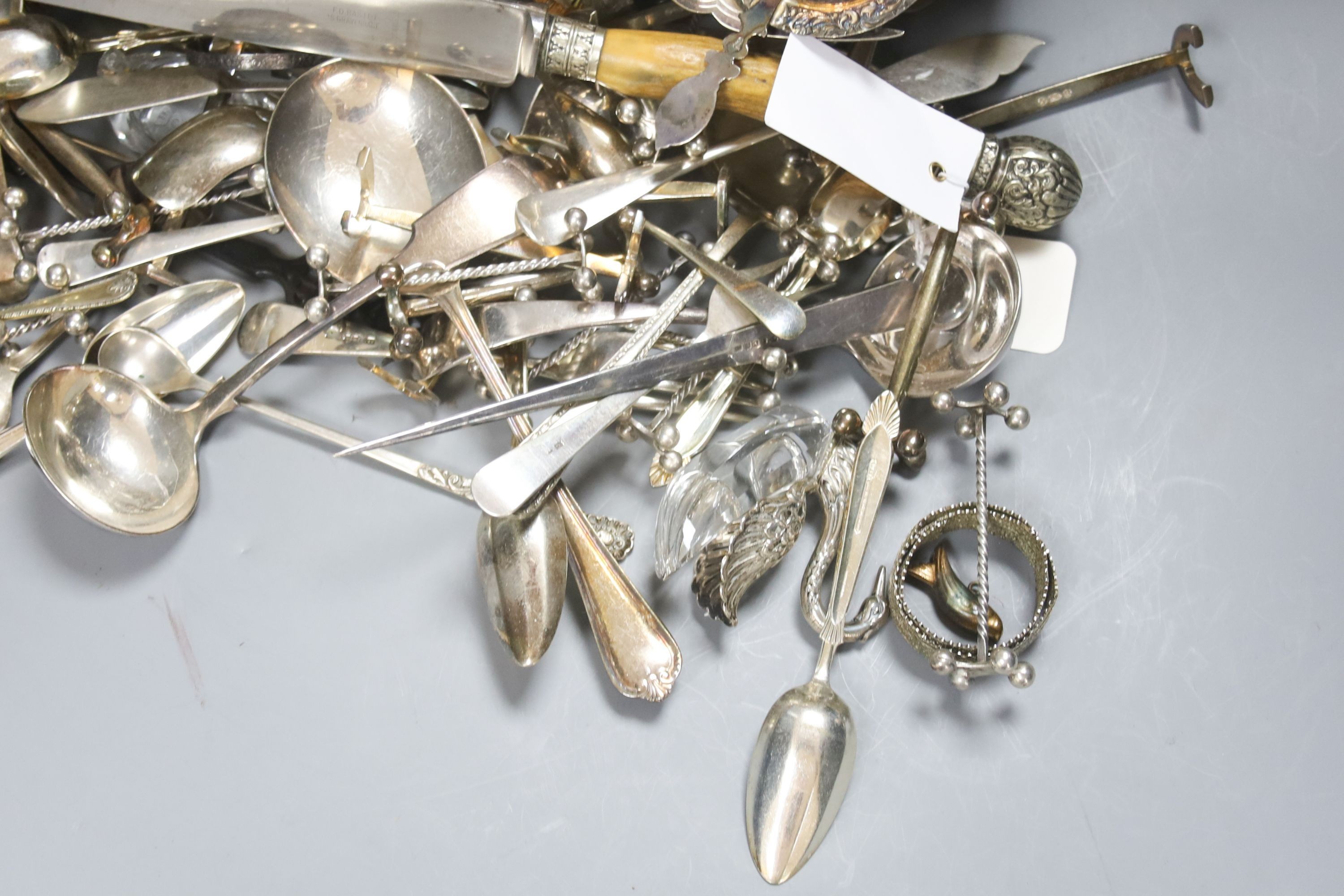 A quantity of silver plated flatware to include three piece stag horn handled ...... silver and mother of pearl handled dessert eaters